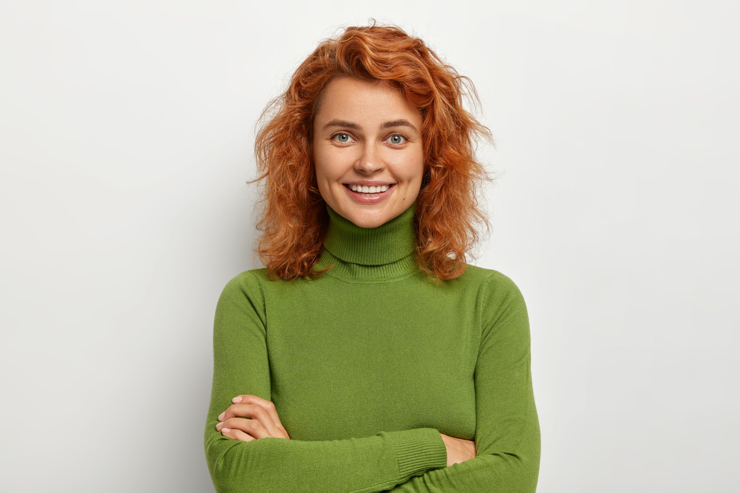 portrait beautiful girl with short ginger hair looks with happy relaxed expression scaled