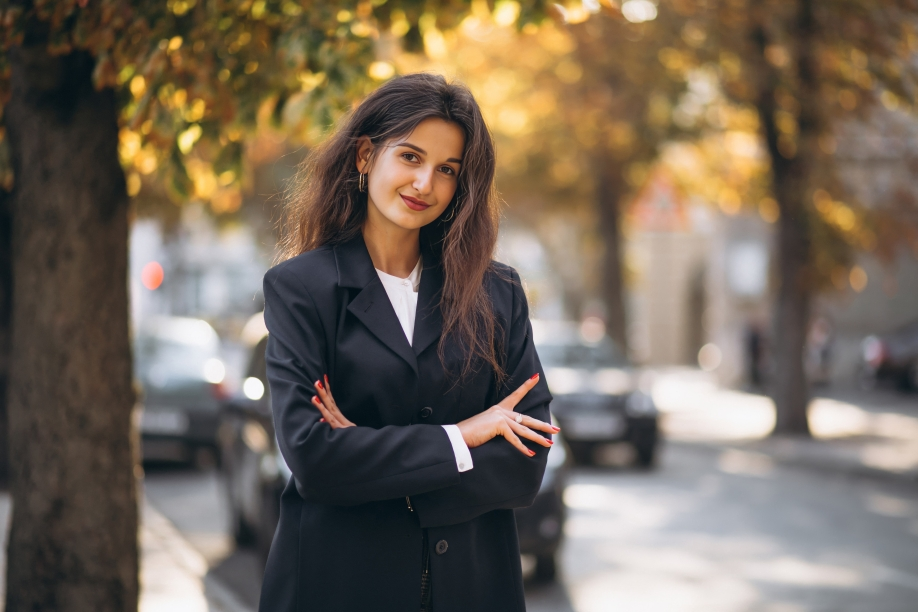 young pretty woman classy outfit autumn street